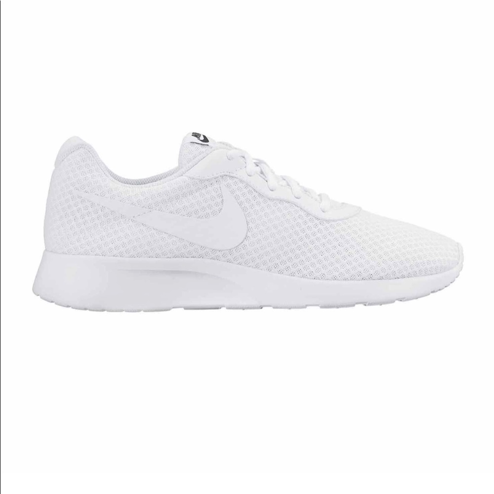 All white Nike running shoes